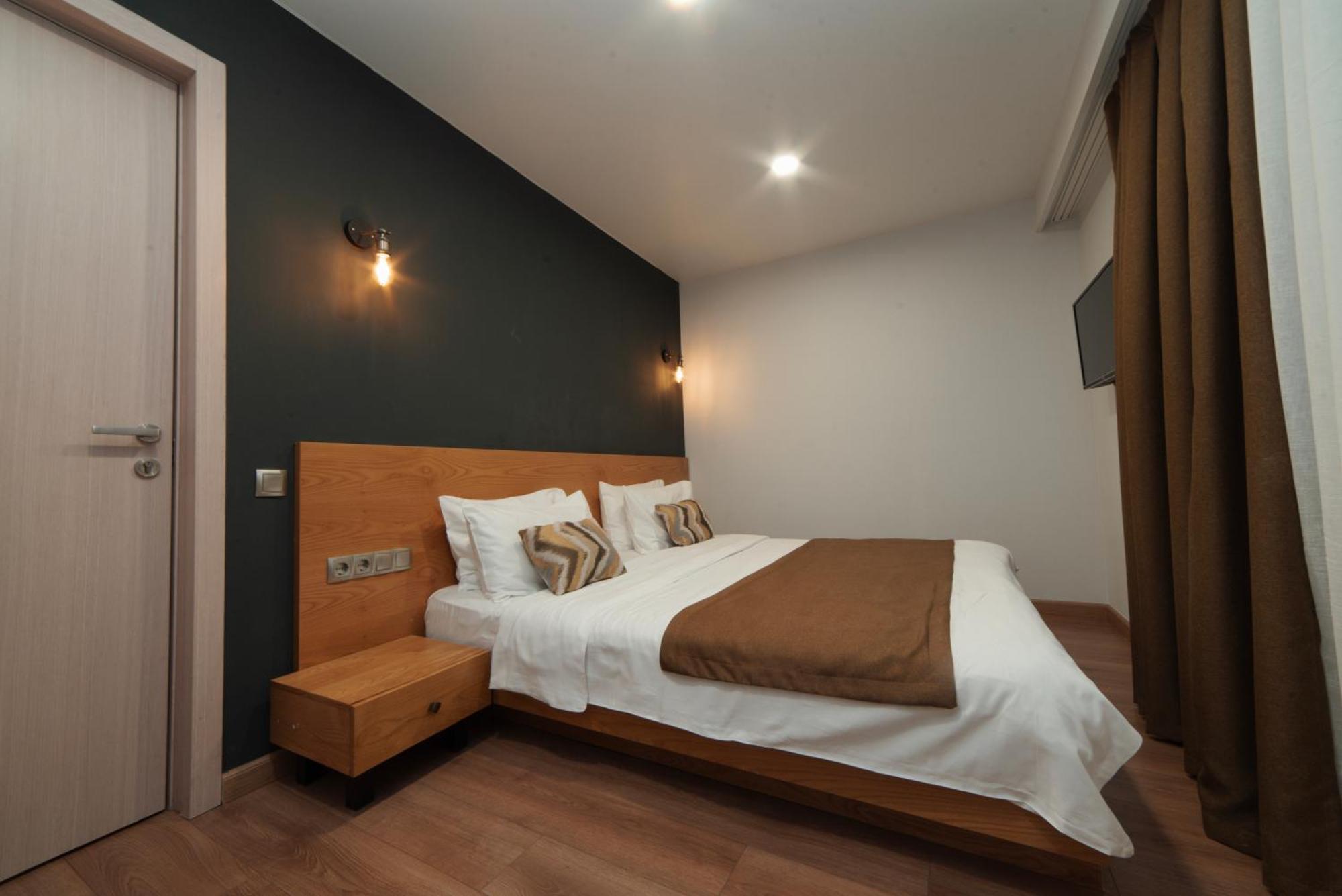 Bakuriani Inn Pokój zdjęcie A bedroom in a hotel